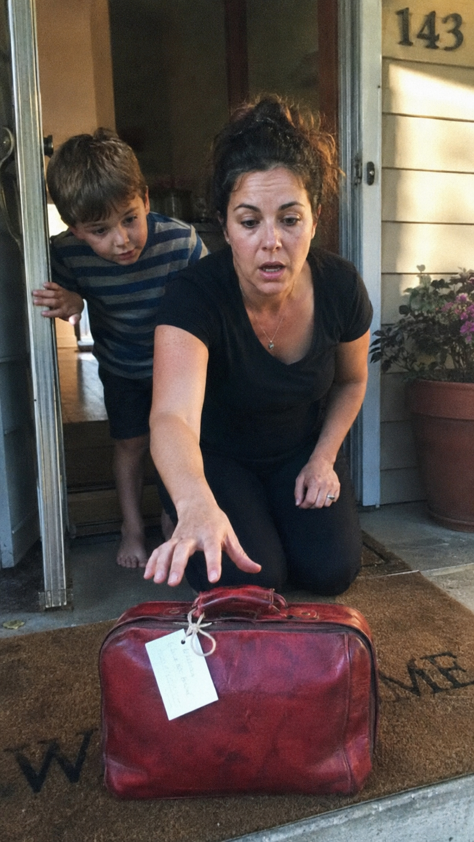 Scarlet Suitcase Mystery Left A Mother Speechless After One Letter